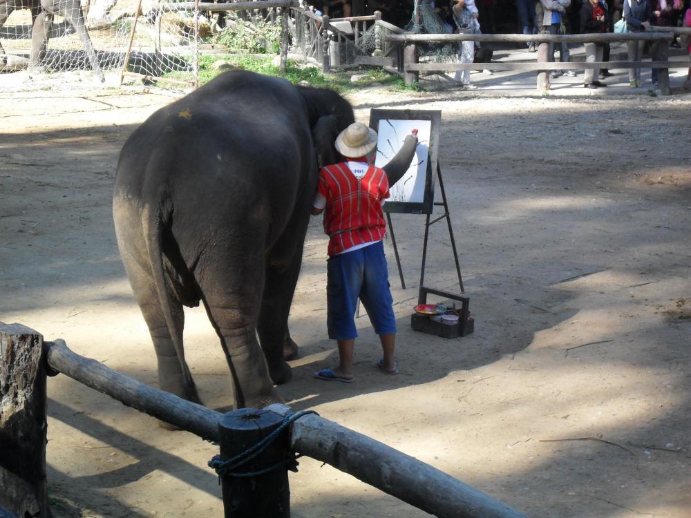 elephants painting bowl of flowers.jpg